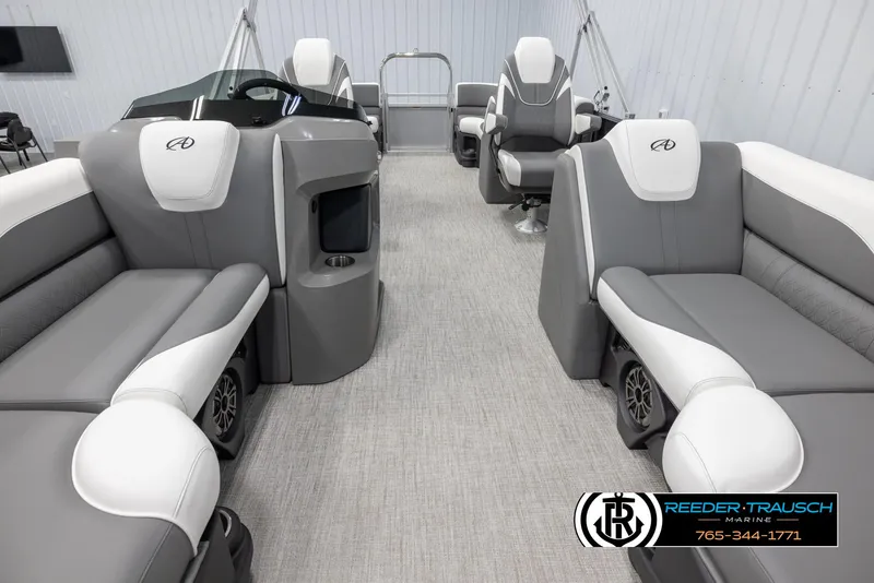 Slide: The Image of 2024 Avalon LSZ QL pontoon boat interior with gray and white seating. - 13