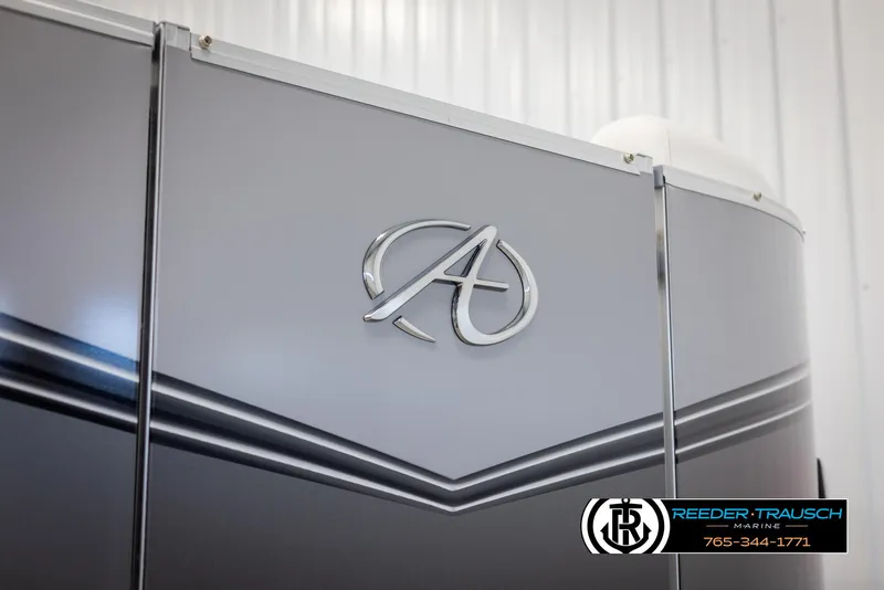 Slide: The Image of 2024 Avalon LSZ QL boat with logo and Reeder-Trausch Marine branding. - 37