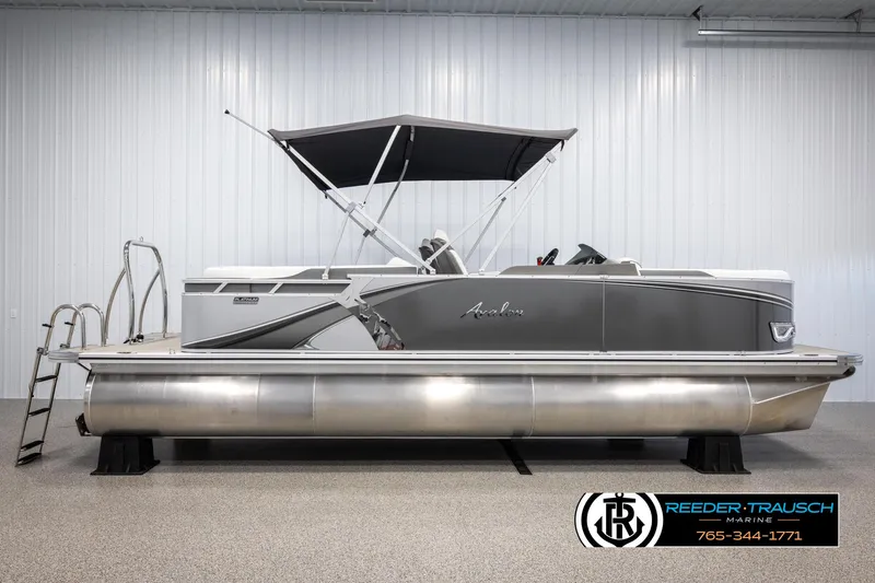 Slide: The Image of 2024 Avalon LSZ QL pontoon boat with canopy in showroom. - 5