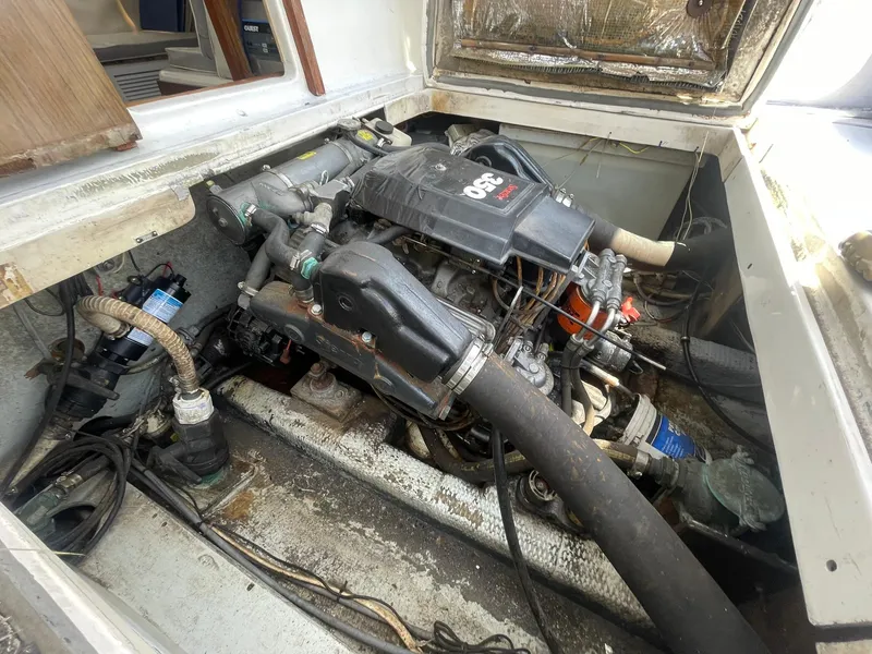 Slide: The Image of 1976 Allmand 25 Express Inboard engine compartment with visible engine components. - 29