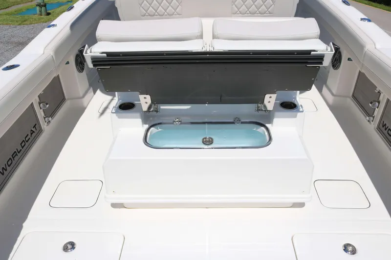 Slide: The Image of 2025 World Cat 280 CC-X boat interior with seating and storage compartments. - 19
