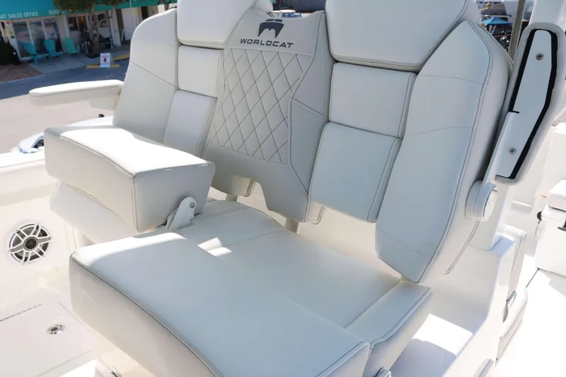 Slide: The Image of Luxurious seating on 2025 World Cat 325 CC boat, featuring premium white upholstery. - 7
