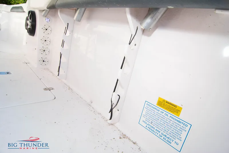 Slide: The Image of 2005 Donzi 32 ZF boat interior with wiring and warning labels. - 20