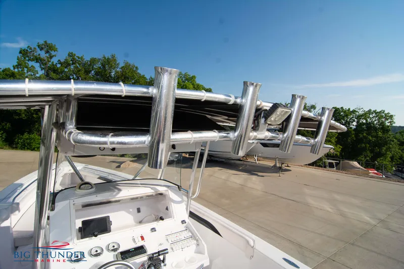 Slide: The Image of 2005 Donzi 32 ZF boat console and rod holders. - 24