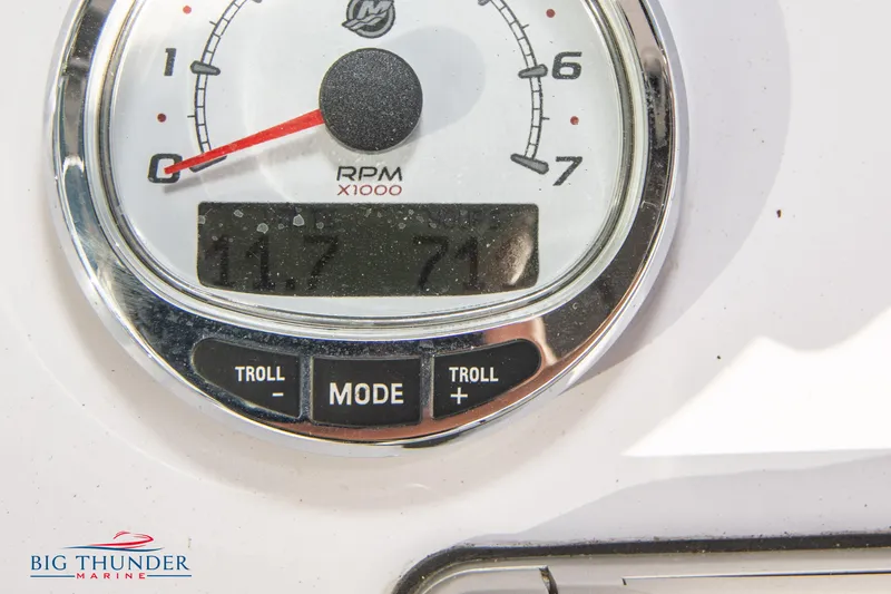 Slide: The Image of Close-up of 2005 Donzi 32 ZF tachometer gauge showing RPM and troll mode. - 32