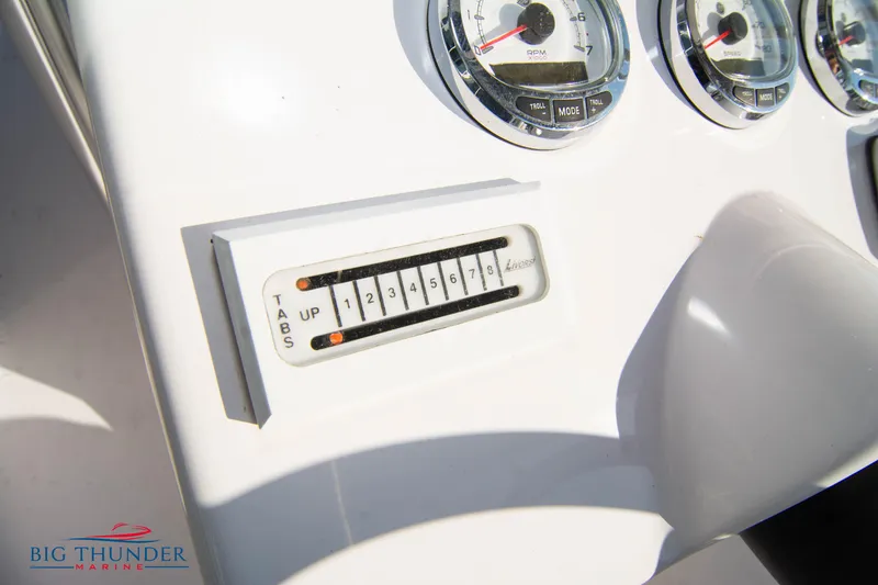 Slide: The Image of Close-up of 2005 Donzi 32 ZF boat dashboard with trim tab indicator and gauges. - 37