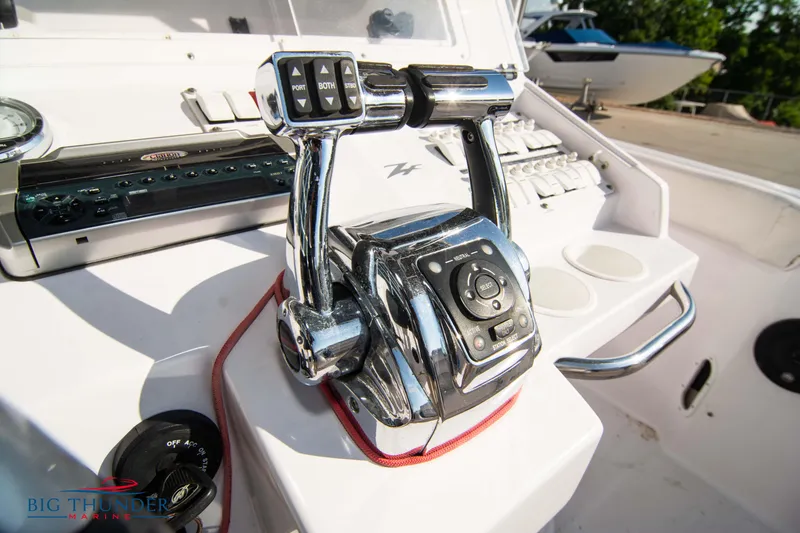 Slide: The Image of Close-up of the control panel on a 2005 Donzi 32 ZF boat. - 38