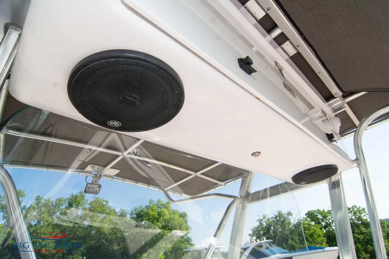 Slide: The Image of 2005 Donzi 32 ZF boat interior with mounted speakers and canopy. - 39