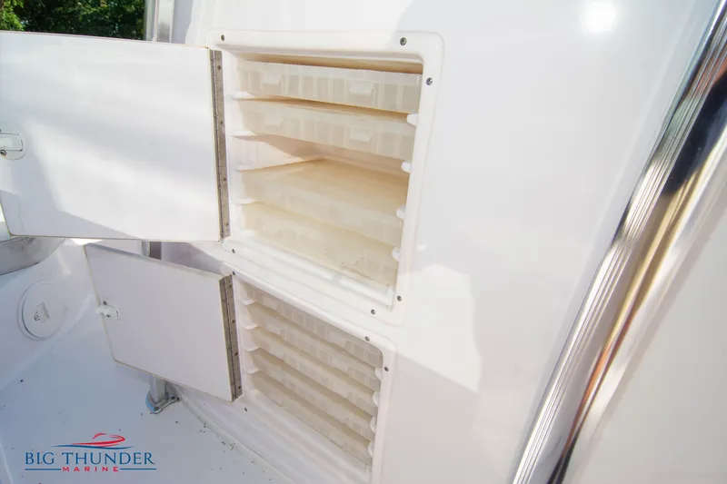 Slide: The Image of Storage compartments on a 2005 Donzi 32 ZF boat. - 46