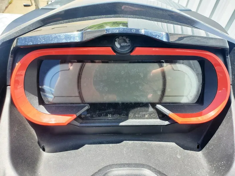 Slide: The Image of 2021 Sea-Doo RXT dashboard with digital display and red trim. - 13