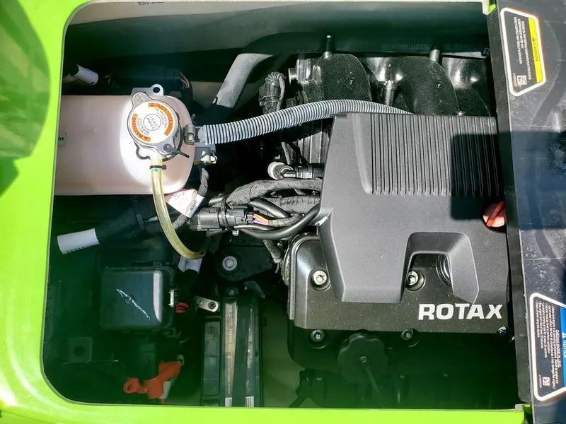 Slide: The Image of 2021 Sea-Doo RXT engine compartment with Rotax engine. - 14