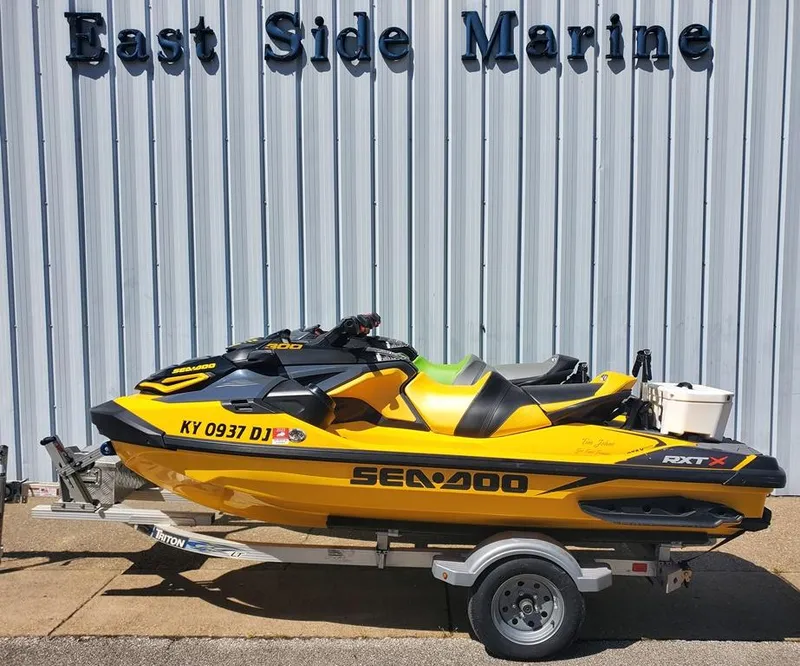 Slide: The Image of 2021 Sea-Doo RXT jet ski on trailer at East Side Marine. - 18