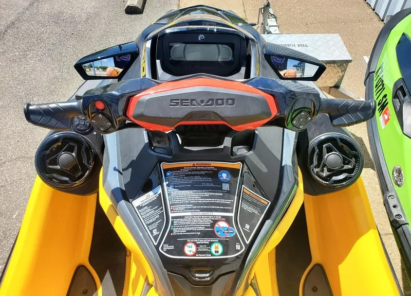 Slide: The Image of 2021 Sea-Doo RXT jet ski dashboard with handlebars and control panel. - 3