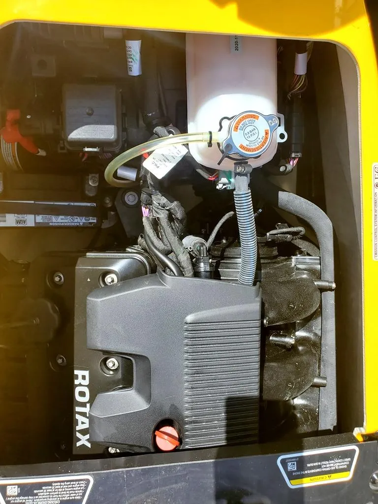 Slide: The Image of 2021 Sea-Doo RXT engine compartment with Rotax engine. - 7