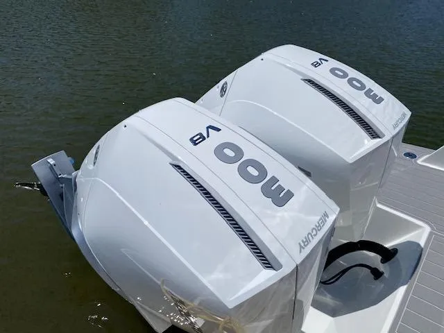 Slide: The Image of Twin Mercury outboard engines on 2024 Beneteau Gran Turismo 32 boat. - 3