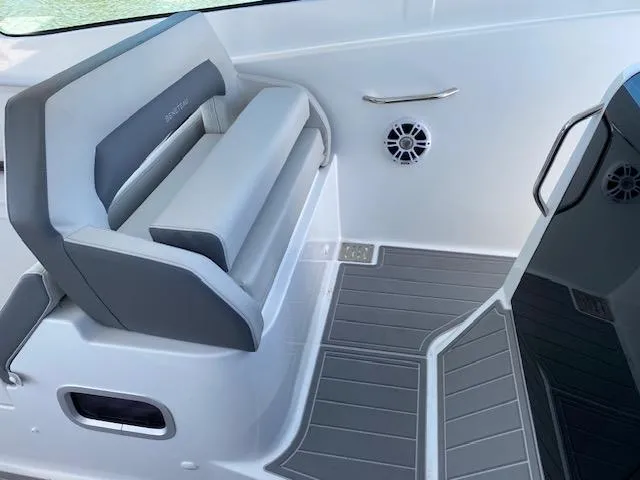 Slide: The Image of 2024 Beneteau Gran Turismo 32 interior seating with modern design and gray accents. - 6