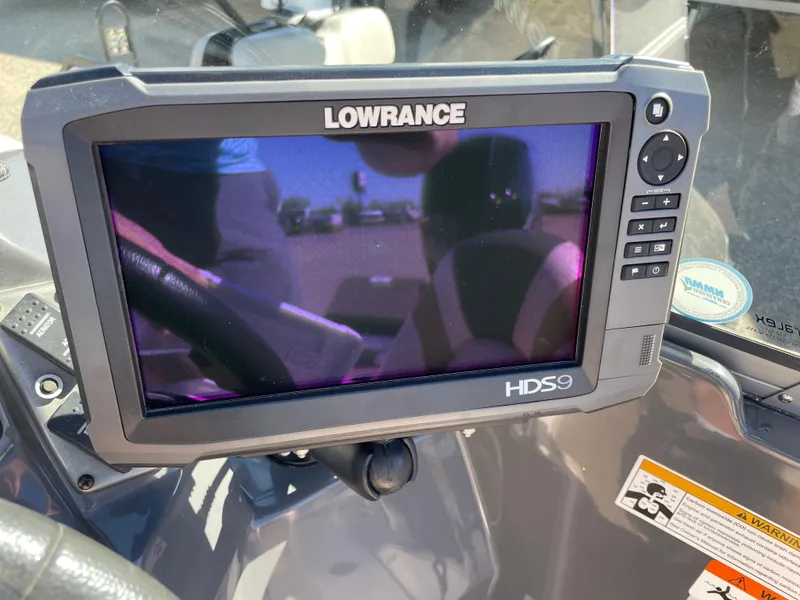 Slide: The Image of Lowrance HDS9 fishfinder on 2012 Larson FX 1750 DC boat dashboard. - 13
