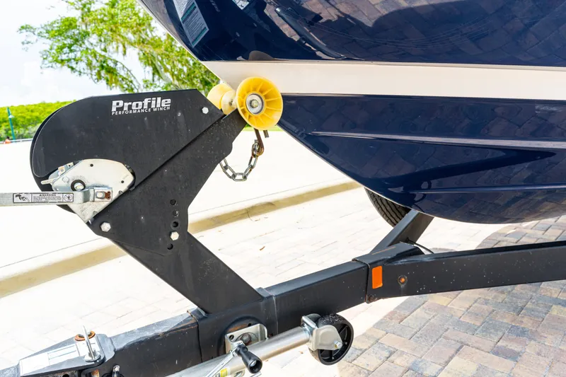 Slide: The Image of 2021 Yamaha Boats 252S on trailer, close-up of bow and winch system. - 10