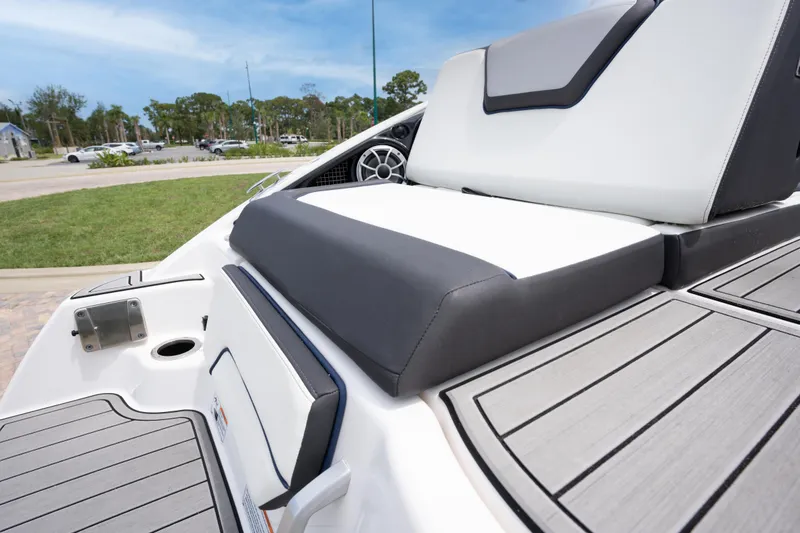 Slide: The Image of 2021 Yamaha Boats 252S interior with sleek seating and modern design. - 19
