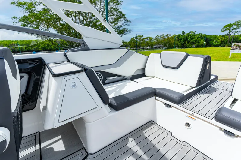 Slide: The Image of 2021 Yamaha Boats 252S interior with sleek seating and modern design. - 22