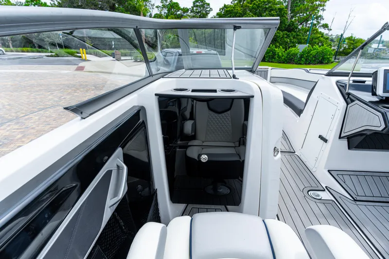 Slide: The Image of 2021 Yamaha Boats 252S interior with sleek seating and modern design. - 37
