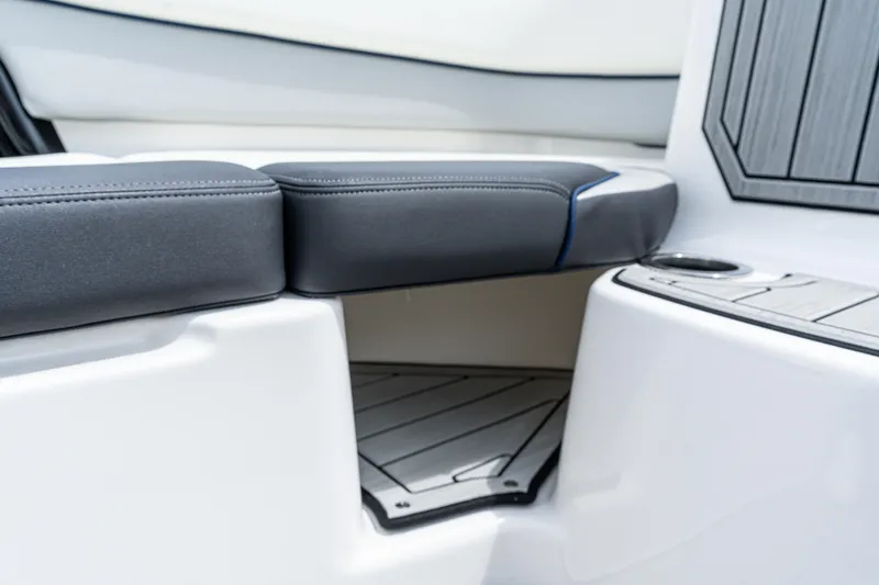 Slide: The Image of 2021 Yamaha Boats 252S interior seating with sleek design and modern upholstery. - 46