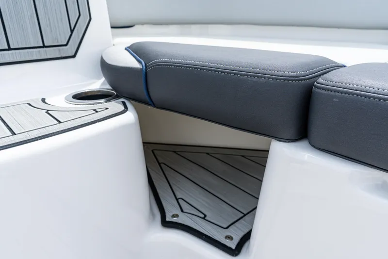 Slide: The Image of 2021 Yamaha Boats 252S interior seating with cup holder and stylish flooring. - 47