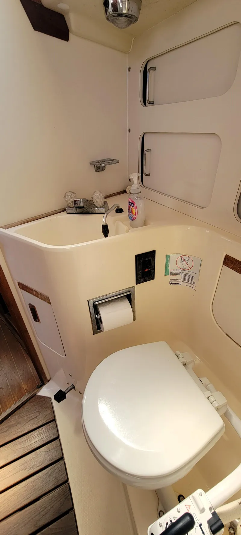 Slide: The Image of 1988 Sabre 38 MkII sailboat bathroom with sink and toilet. - 33