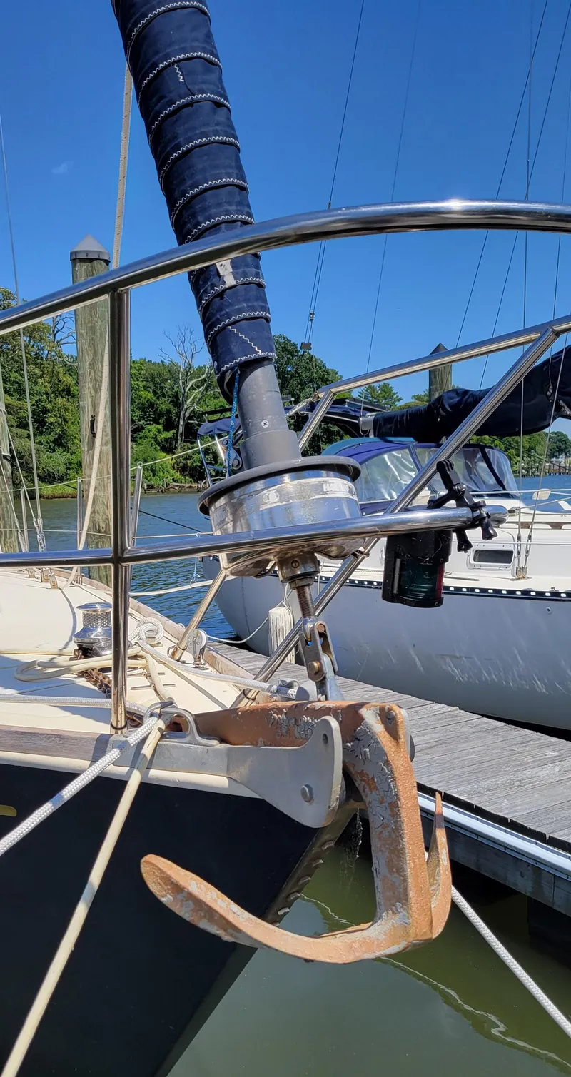 Slide: The Image of 1988 Sabre 38 MkII sailboat with anchor and rigging at dock. - 5