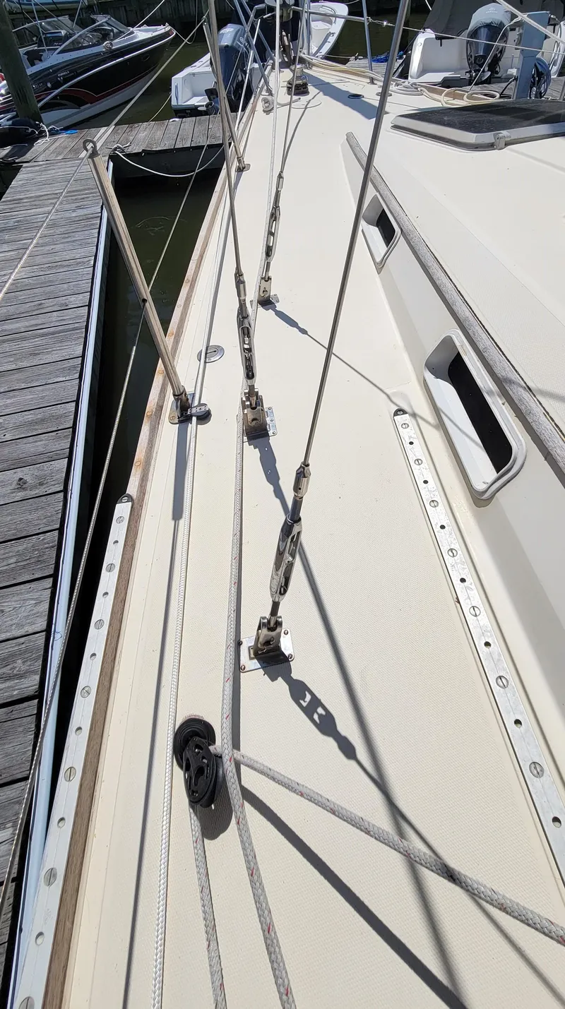 Slide: The Image of Deck of 1988 Sabre 38 MkII sailboat docked at marina. - 8