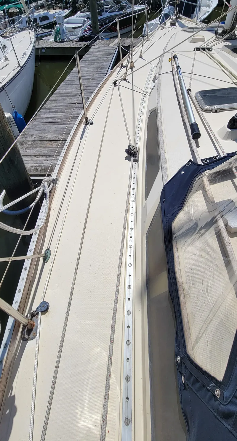 Slide: The Image of 1988 Sabre 38 MkII sailboat deck view at marina. - 9