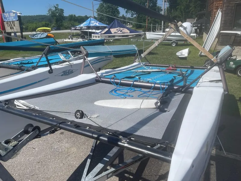 Slide: The Image of 2004 Hobie Getaway catamaran sailboat on trailer, ready for sailing. - 2