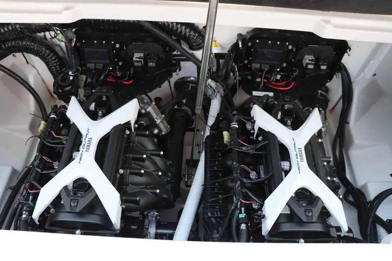 Slide: The Image of Twin high-output engines in the 2024 Yamaha Boats AR250. - 19