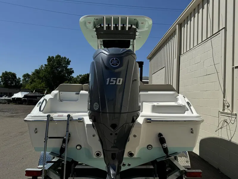 Slide: The Image of 2024 Key West 219 FS boat with Yamaha 150 outboard motor, rear view. - 3