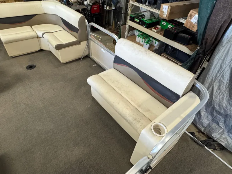 Slide: The Image of Crestliner Batata Bay 2185 boat interior with beige seating, 2010 model. - 7