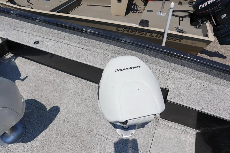 Slide: The Image of Polar Kraft Outlander 2010 CC 2023 boat seat and deck view. - 6