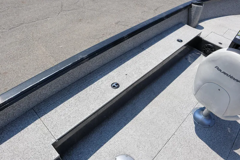 Slide: The Image of 2023 Polar Kraft Outlander 2010 CC boat interior with seating and storage. - 7