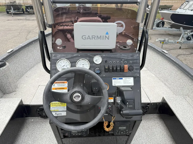 Slide: The Image of Control panel of 2023 Polar Kraft Outlander 2010 CC boat with Garmin navigation system. - 9