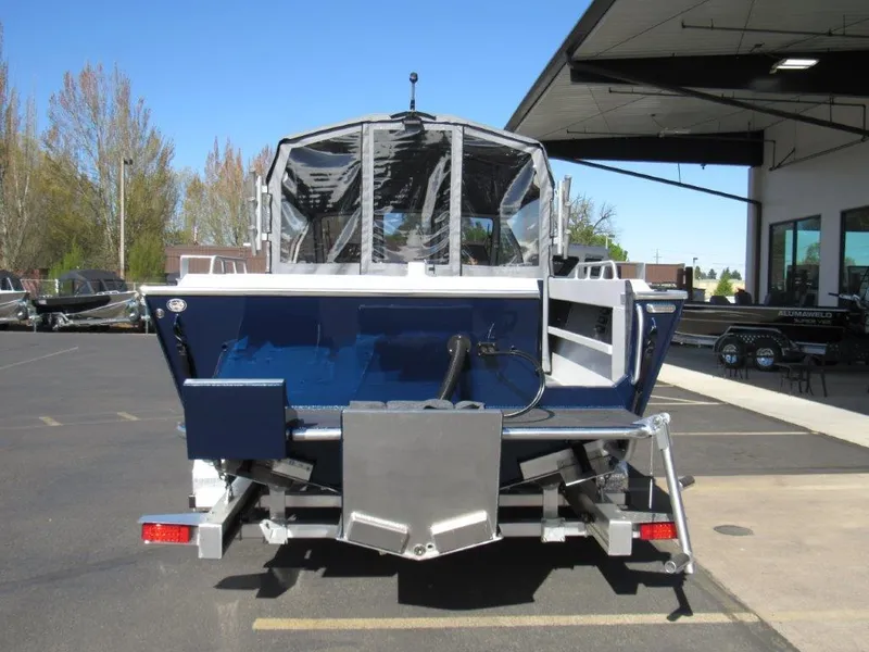 Slide: The Image of 2024 North River 23 SEAHAWK RTF boat rear view at dealership. - 4