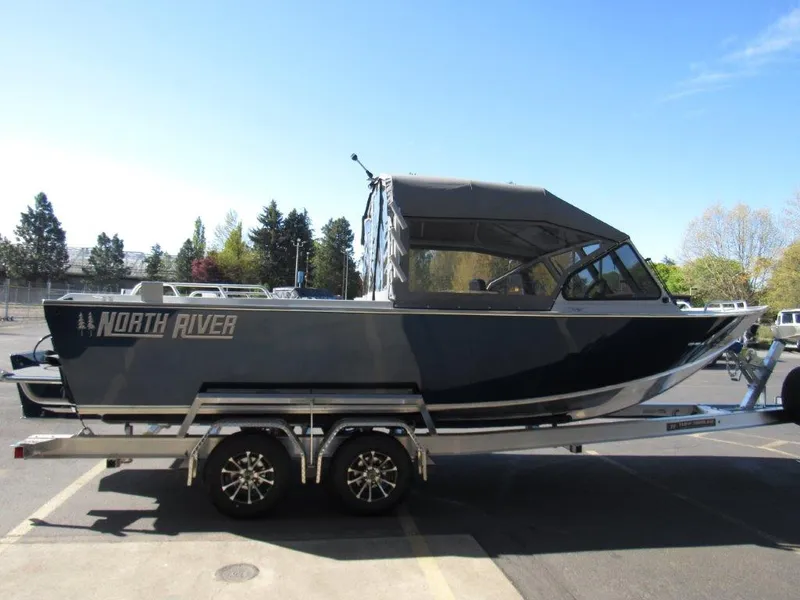 Slide: The Image of 2024 North River 23 Seahawk RTF boat on trailer, side view. - 6