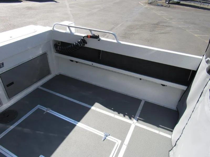 Slide: The Image of Interior deck of 2024 North River 23 SEAHAWK RTF boat, showing storage compartments. - 9