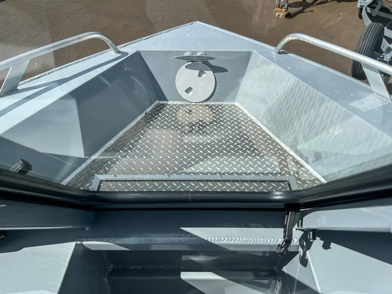 Slide: The Image of 2024 Hewescraft 200 Sportsman boat bow with diamond plate flooring. - 7