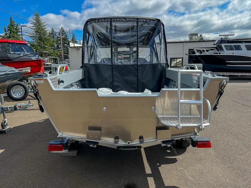 Slide: The Image of 2024 Hewescraft 200 Sportsman boat rear view with ladder and canopy. - 4
