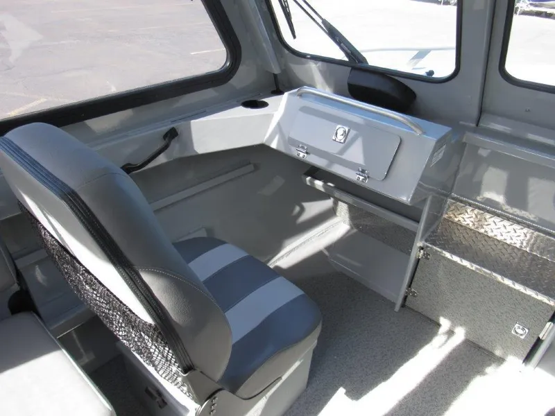 Slide: The Image of Interior of 2024 Hewescraft 200 PRO V ET HT boat with seating and storage. - 13