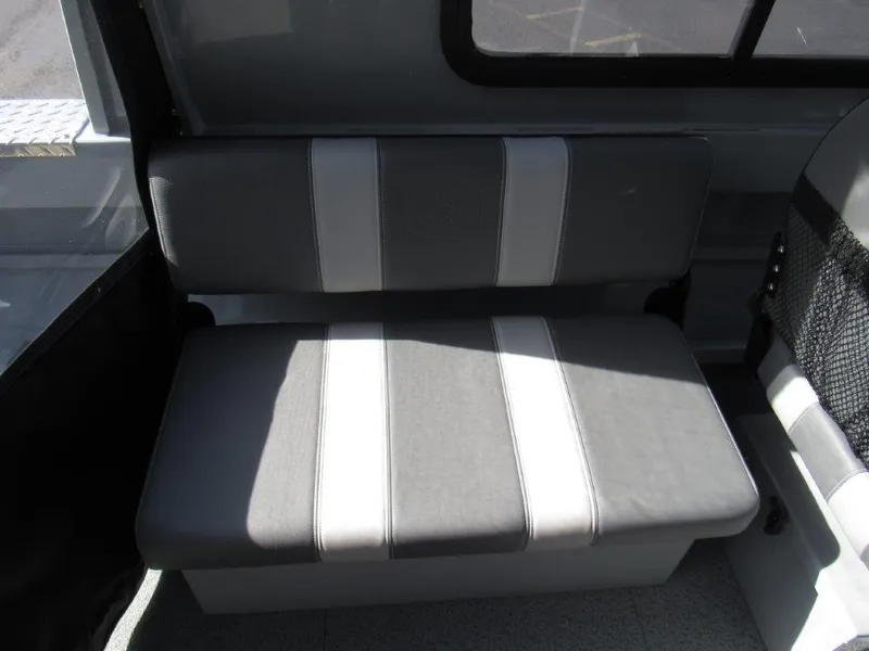 Slide: The Image of 2024 Hewescraft 200 PRO V ET HT interior seating with gray and white upholstery. - 14