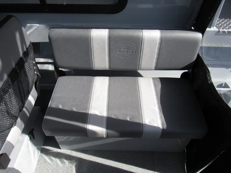 Slide: The Image of 2024 Hewescraft 200 PRO V ET HT interior seating with grey and white upholstery. - 15
