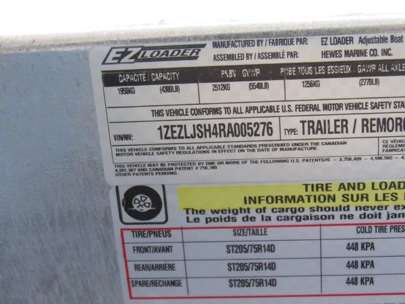 Slide: The Image of 2024 Hewescraft 200 PRO V ET HT trailer label with VIN 1ZEZLJSH4RA005276, capacity, - 19