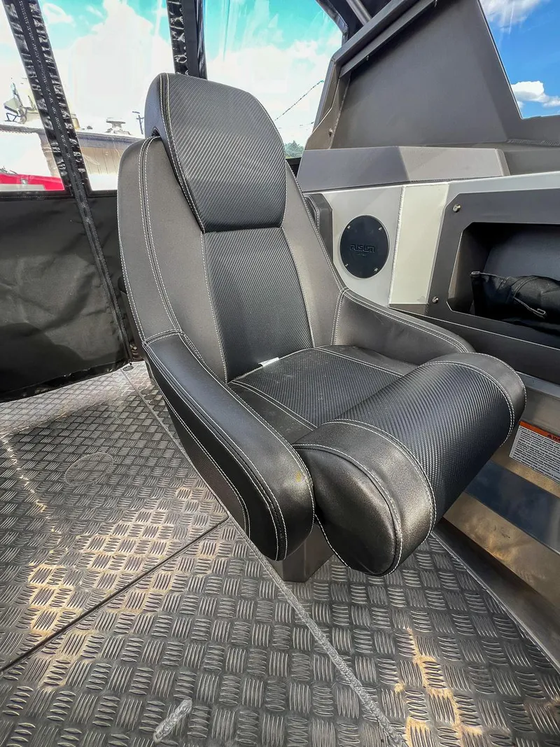 Slide: The Image of 2024 Stabicraft 2050 Treker Sportfish interior seat with black upholstery. - 11