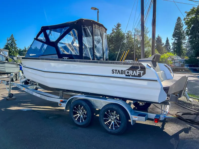 Slide: The Image of 2024 Stabicraft 2050 Treker Sportfish boat on trailer in outdoor setting. - 3