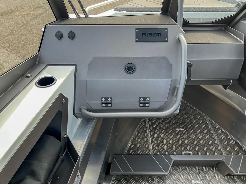 Slide: The Image of Interior of 2024 Stabicraft 2050 Treker Sportfish boat with Fusion audio system. - 9